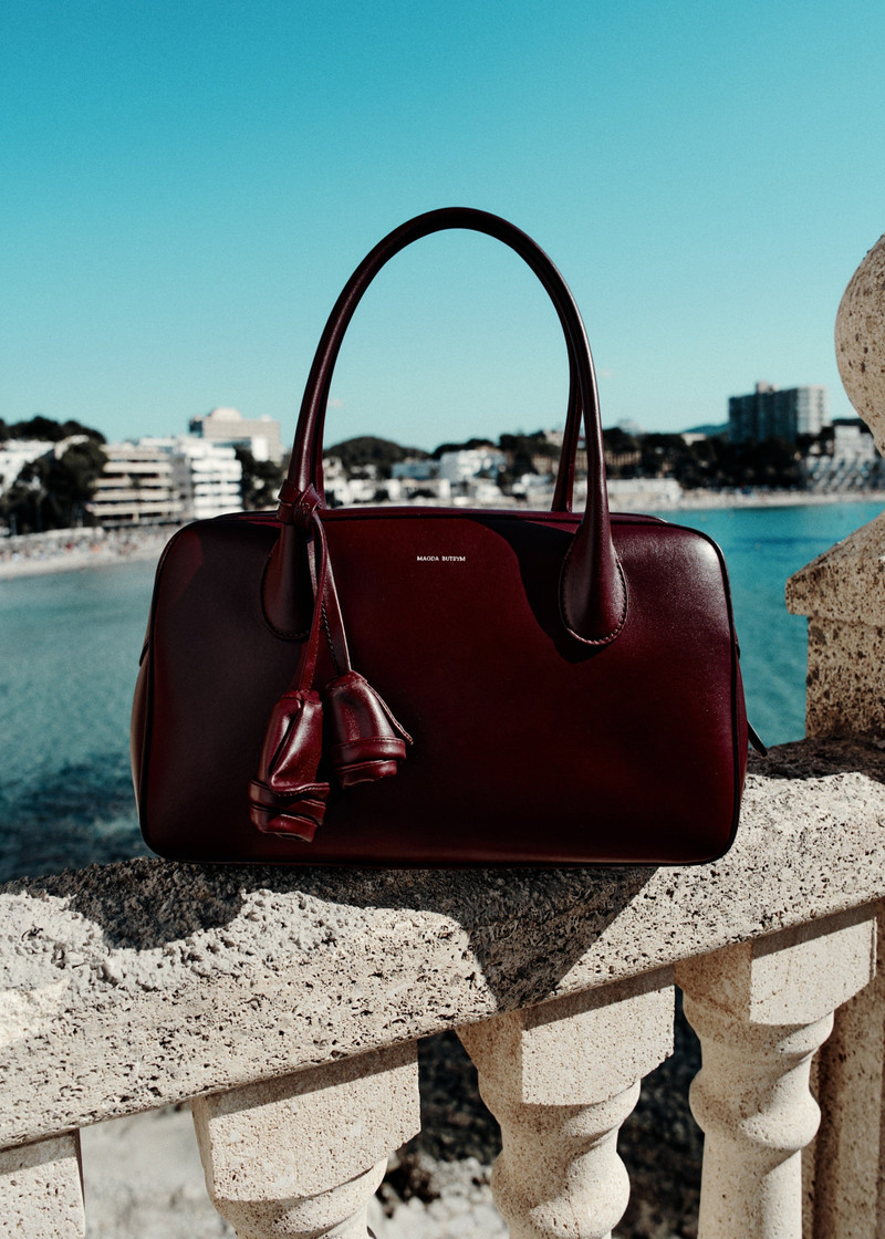 Brigitte in burgundy leather with flower charm 4
