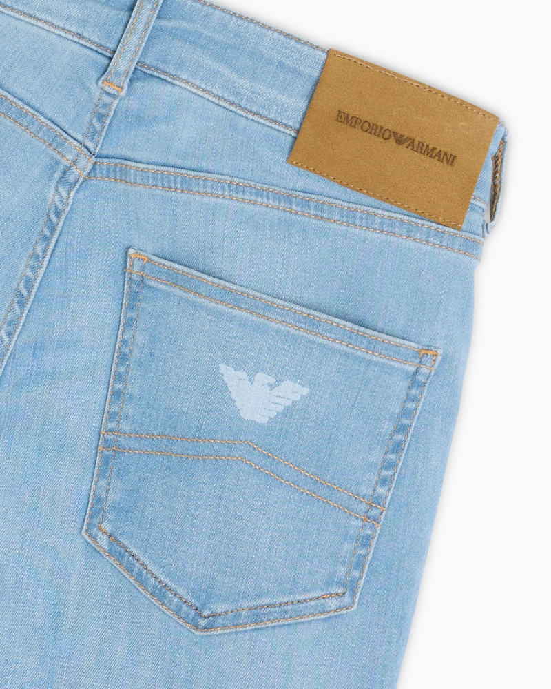 J47 MID-HIGH RISE FLARED-HEM JEANS IN STRETCH DENIM 6