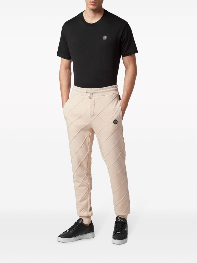 PHILIPP PLEIN logo-appliquÃ© quilted track pants outlook