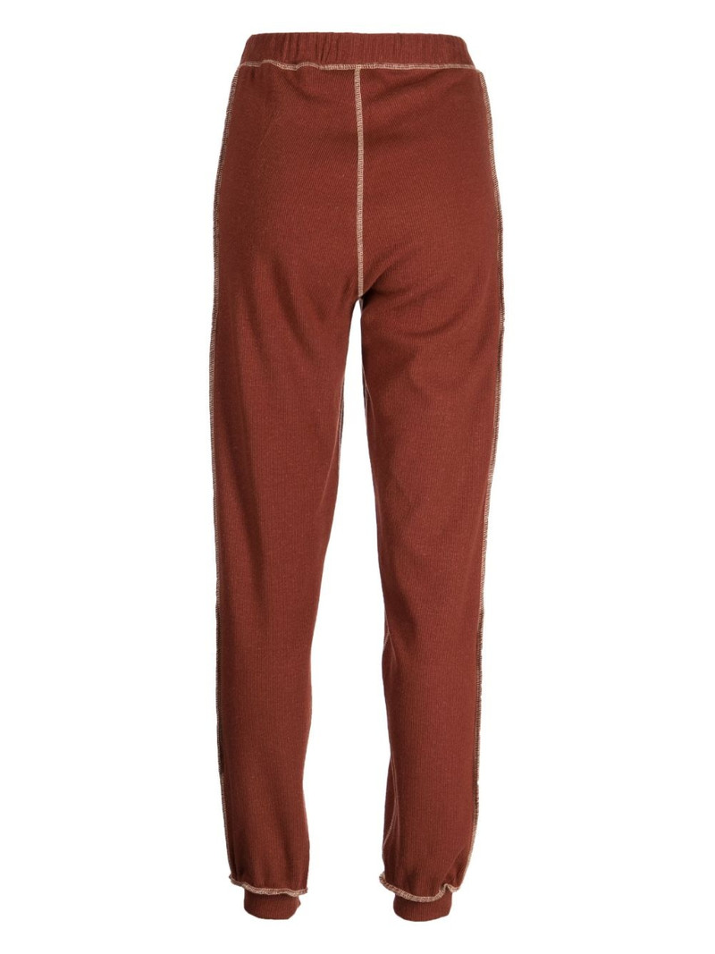 BASERANGE exposed-seam fine-ribbed track pants outlook
