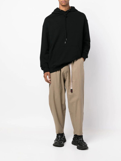 White Mountaineering drop-crotch tapered-leg trouser outlook