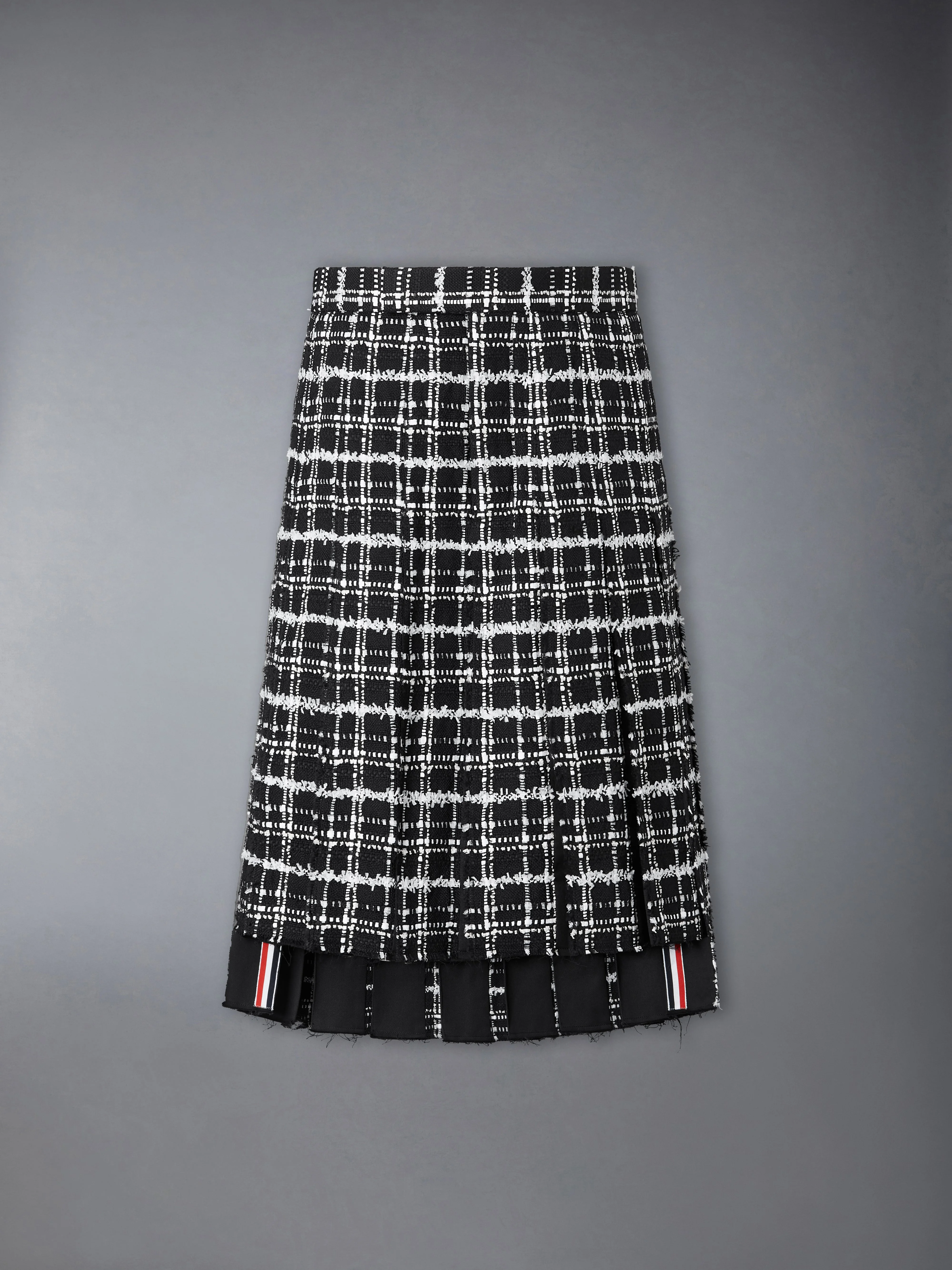 RIBBON TWEED PLEATED SKIRT WITH FRAY EDGE - 1
