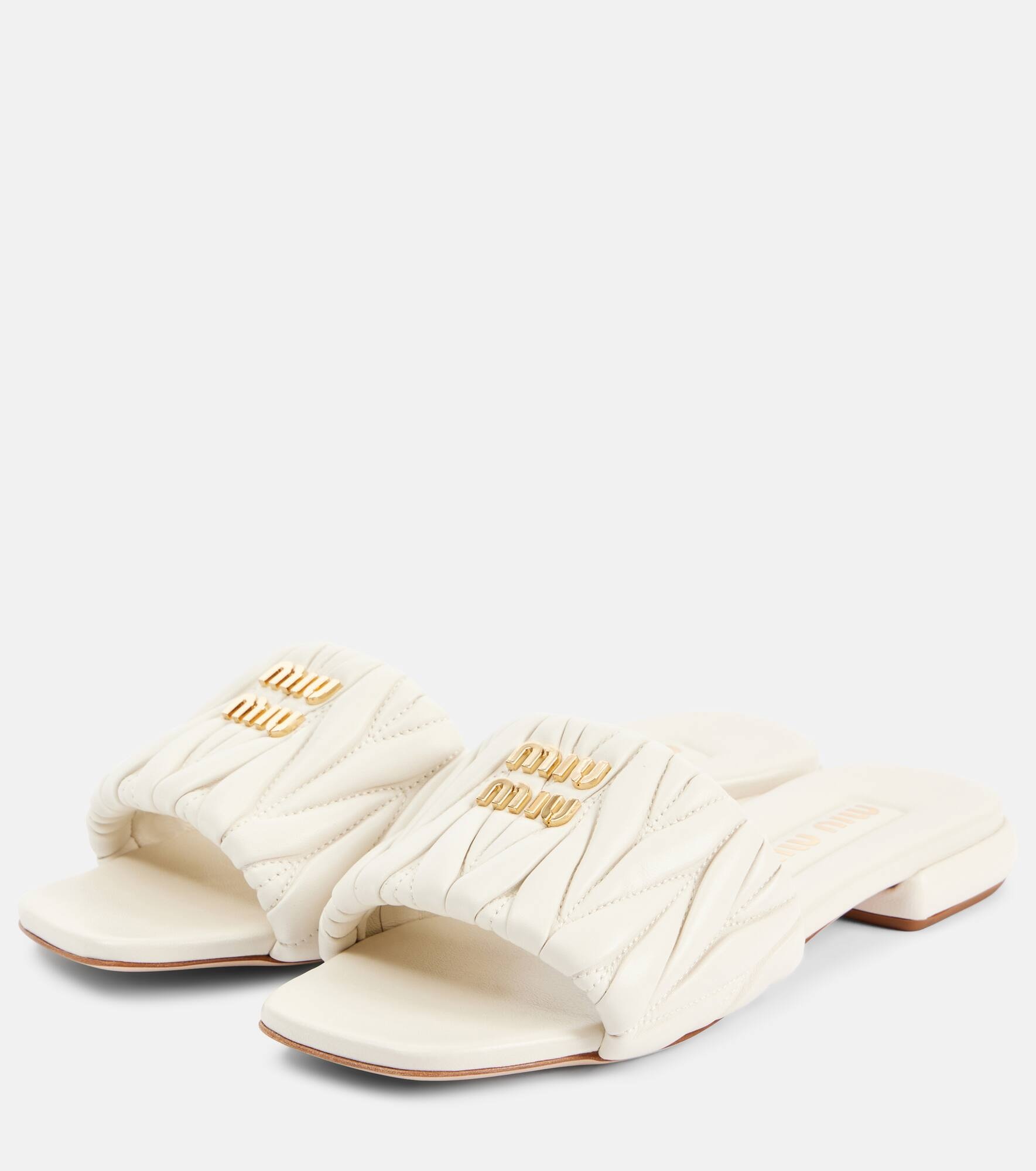 Logo matelassé leather slides - 4