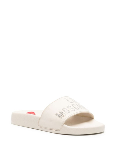 Moschino logo-embellished slip-on flip flops outlook