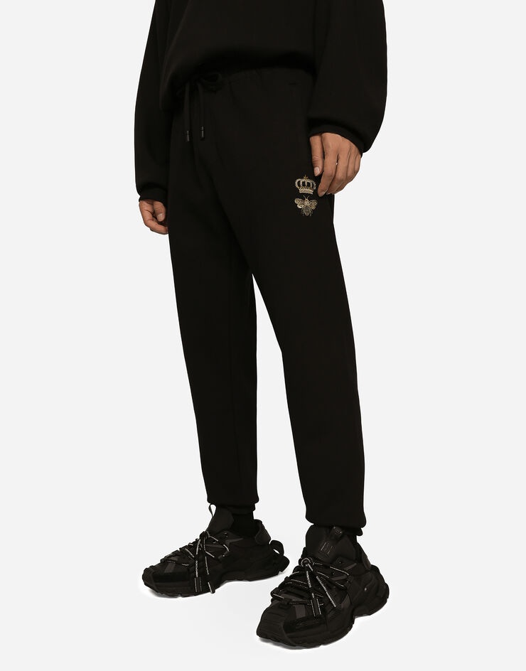 Jersey jogging pants with embroidery - 4