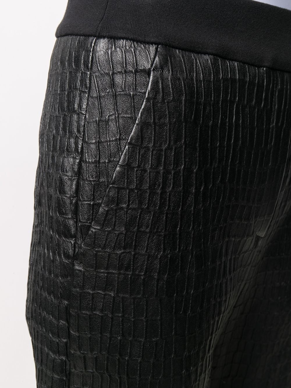 crocodile-effect leather trousers - 5