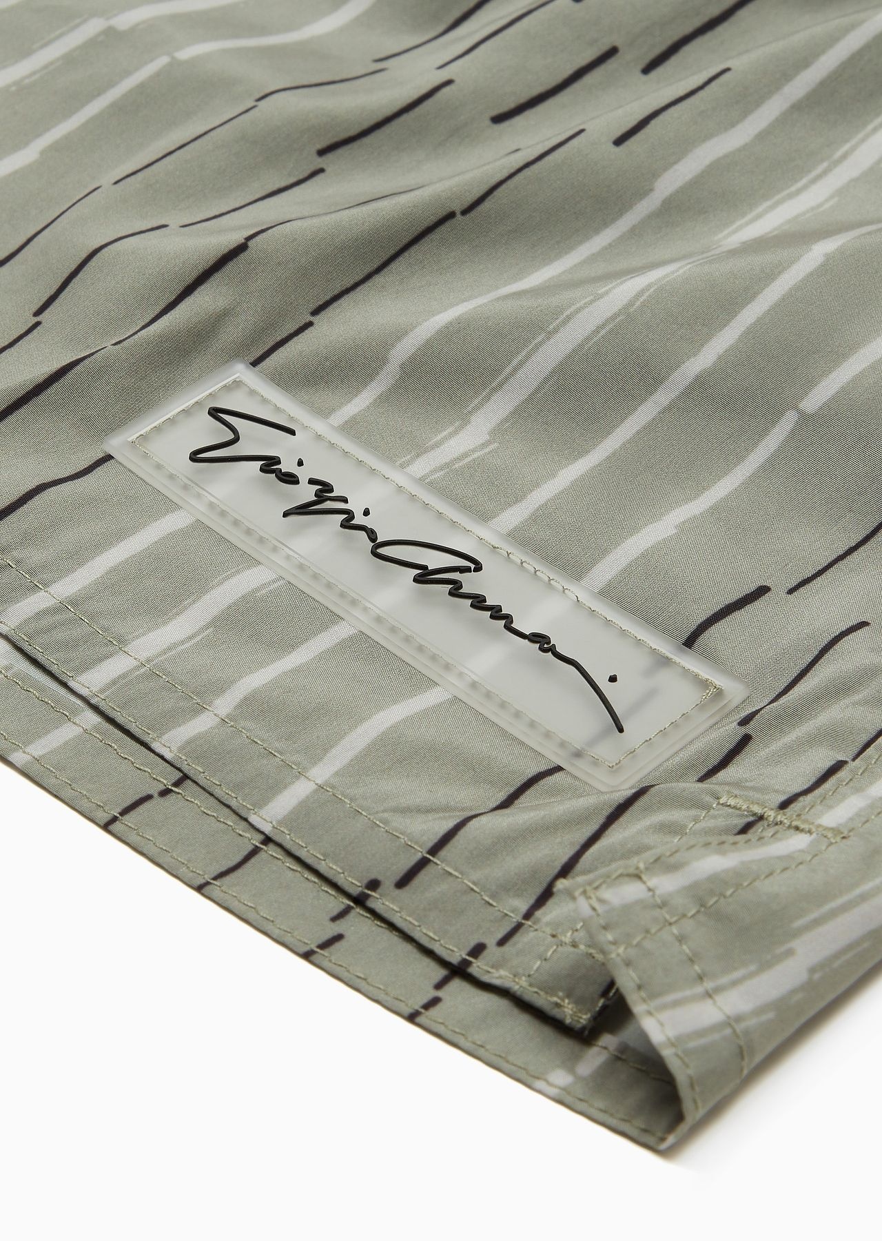 Irregular striped print swim trunks - 4
