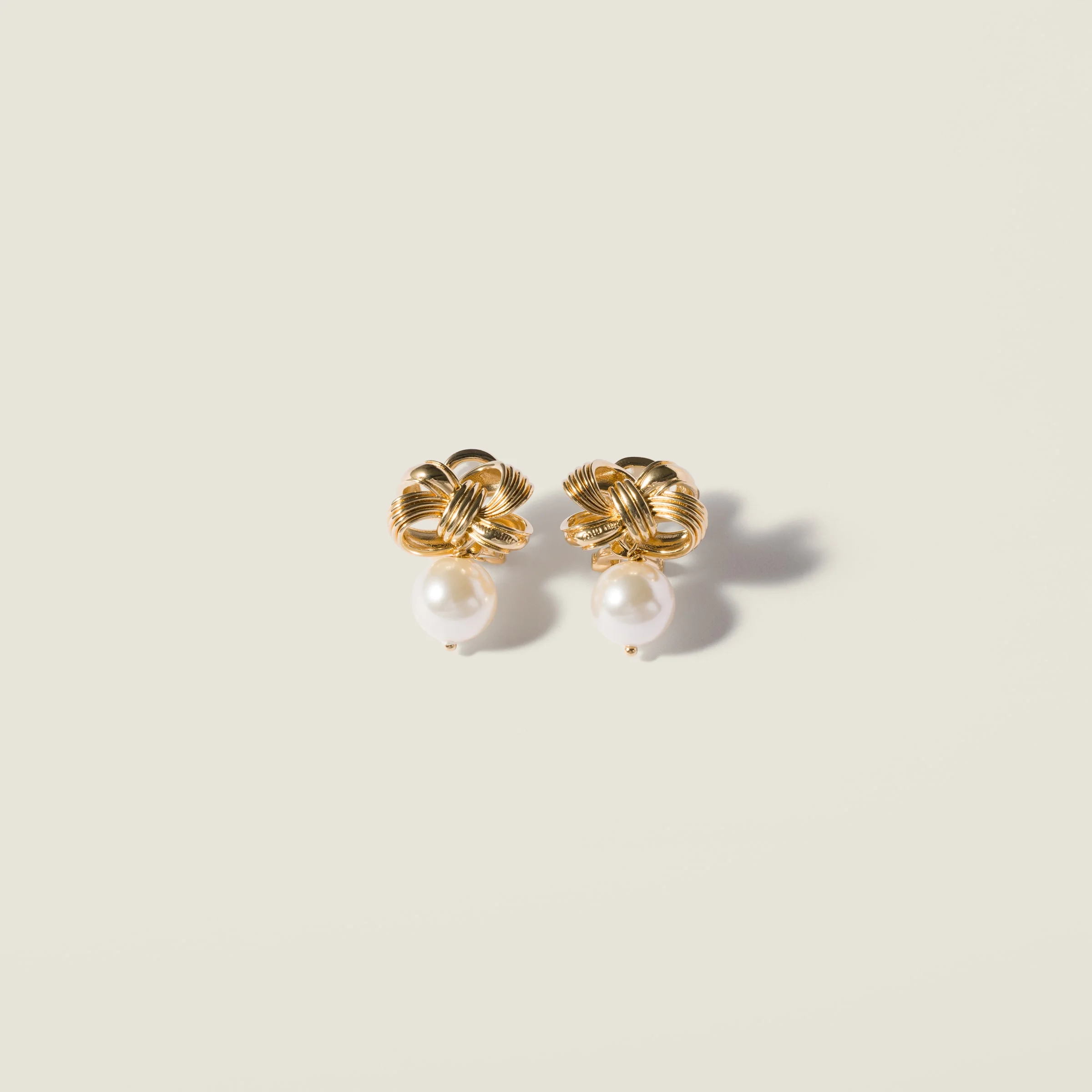 Metal and pearl earrings - 1