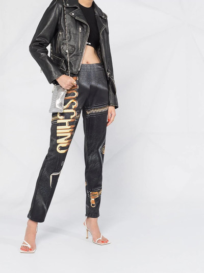 Moschino graphic print track pants outlook