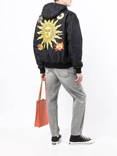 Moschino sun-print puffer jacket outlook