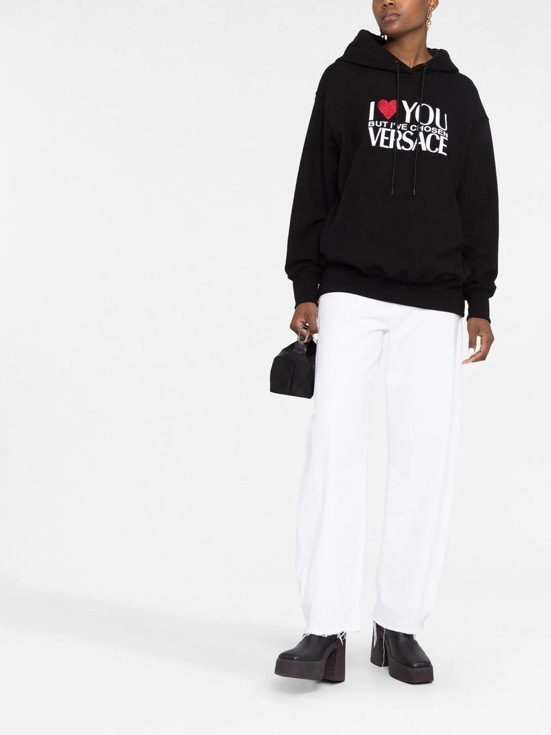 VERSACE crystal-embellished slogan hoodie outlook