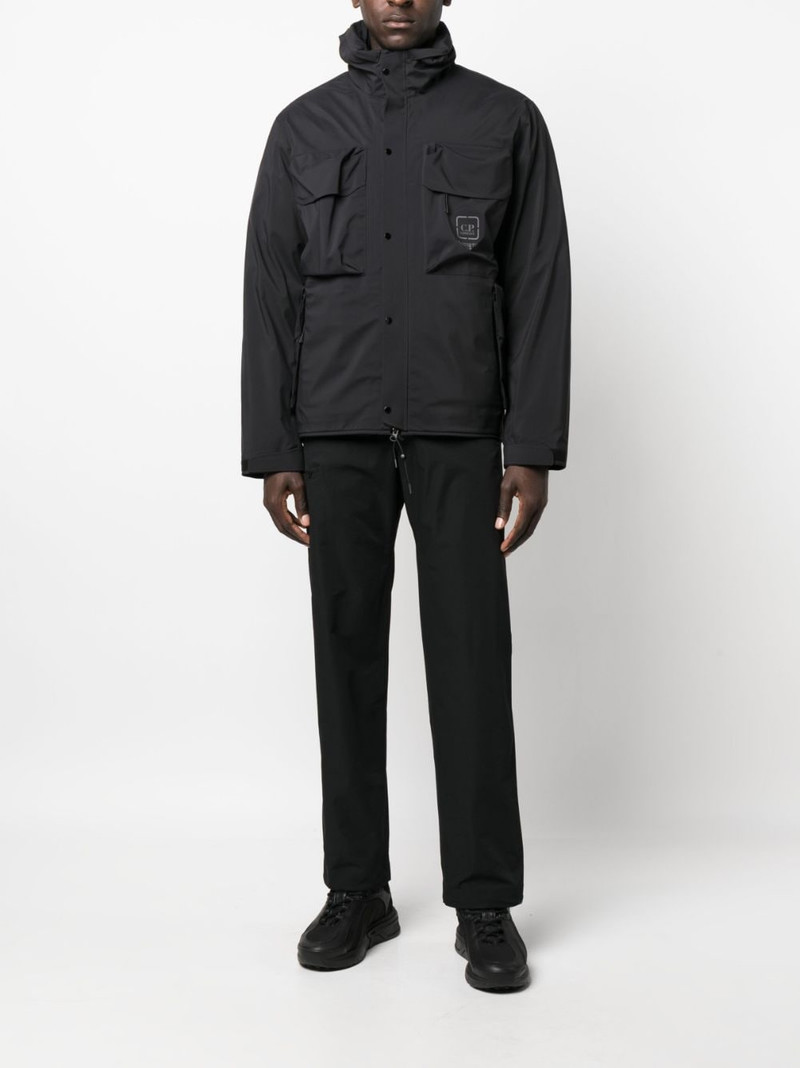 C.P. Company logo-print two-pocket windbreaker outlook