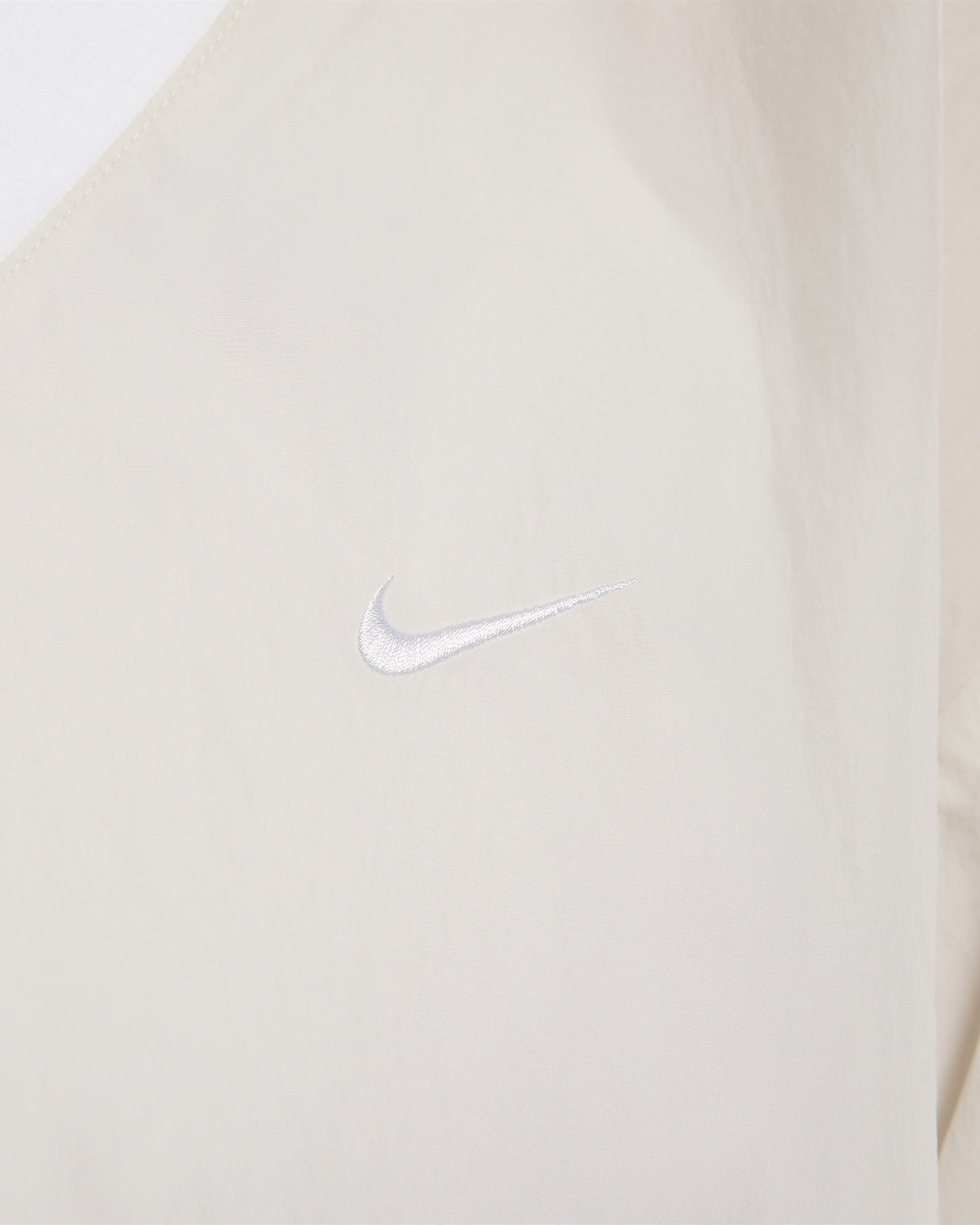 Nike Sportswear Essential Women's Loose UV Woven Long-Sleeve V-Neck Top - 4