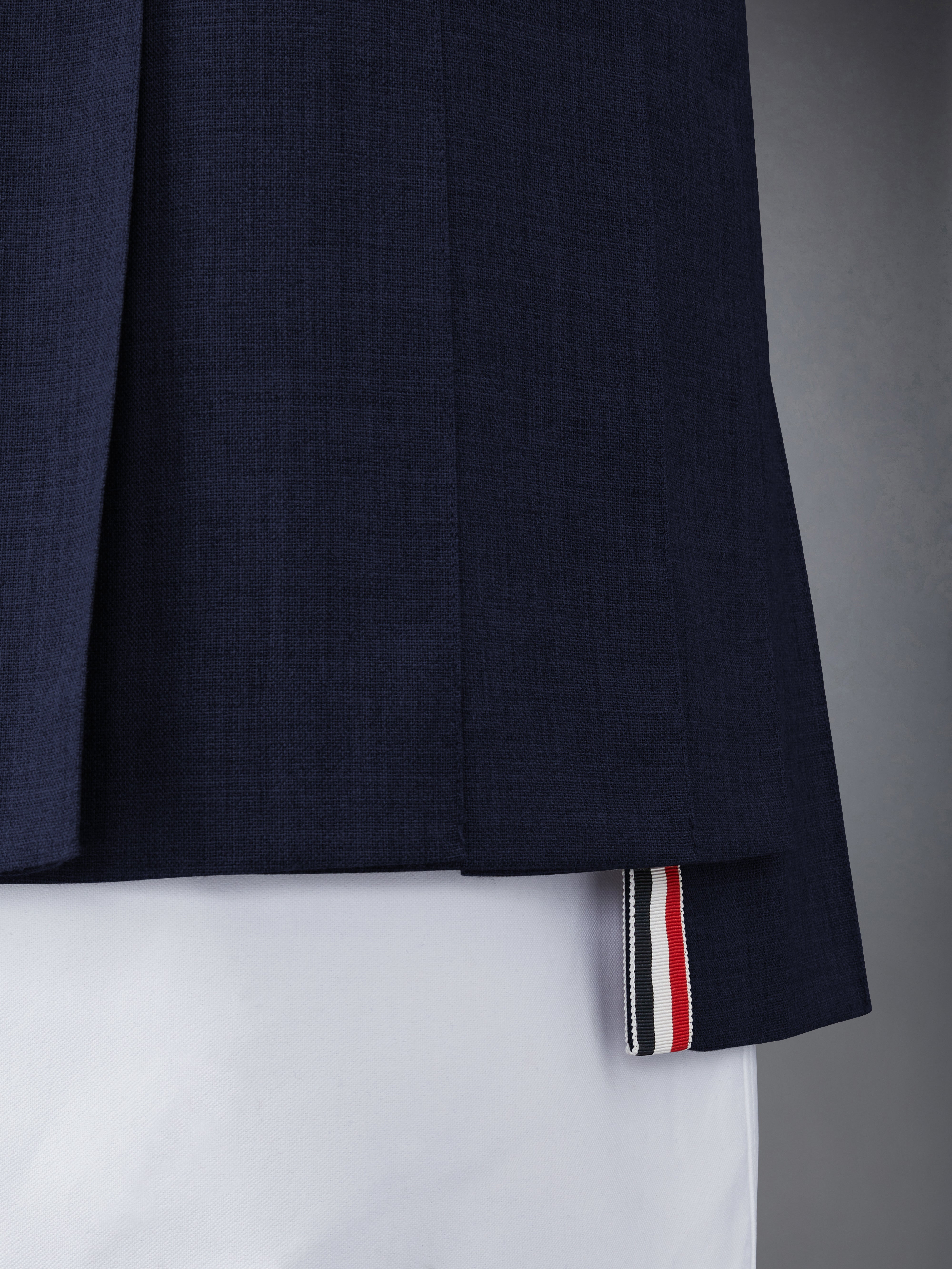 THIGH LENGTH DROPPED BACK PLEATED SKIRT IN 2PLY FRESCO - 5