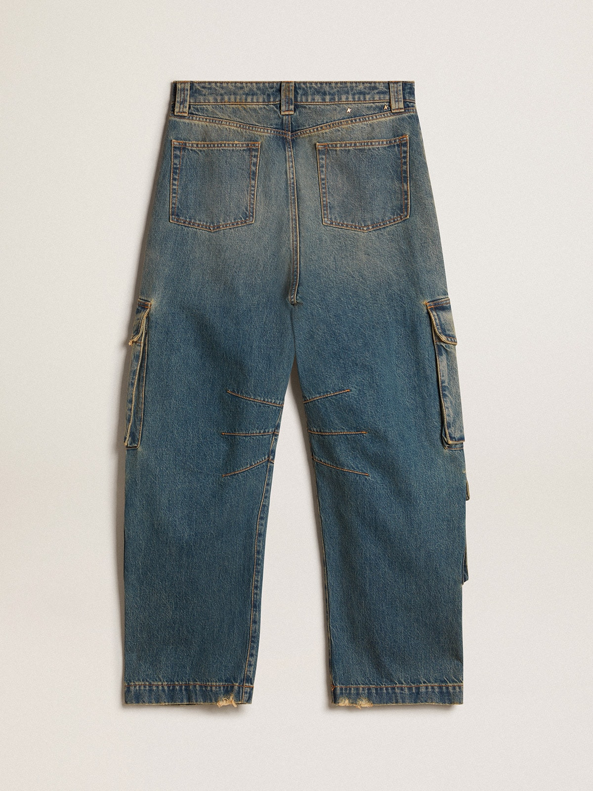 Blue jeans with a distressed finish - 6