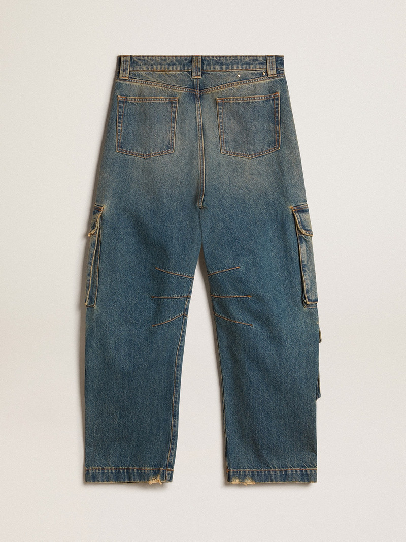 Blue jeans with a distressed finish 6