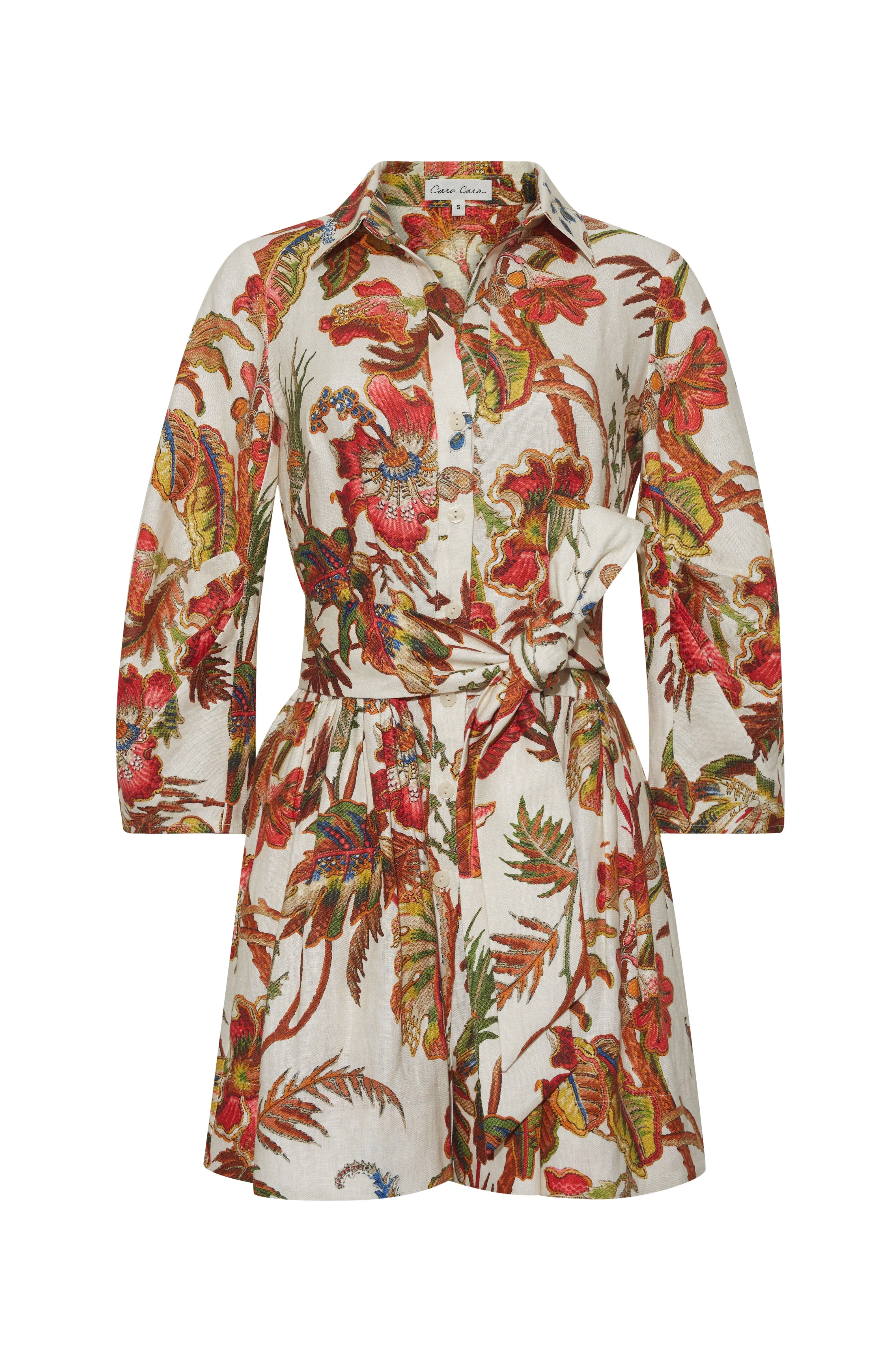 Raya Mini Dress
A Button Up Mini Dress Featuring a Blouson Sleeve and Chic Sash - 1