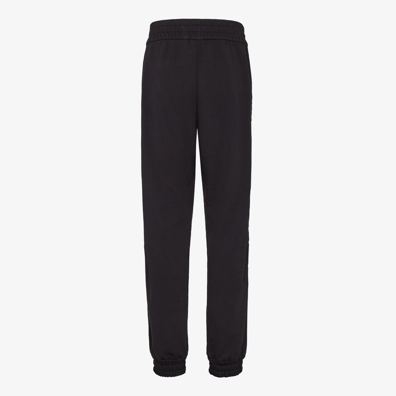 FENDI Straight-cut pants with an elastic waist. Made of black jersey. Customized with side stripes on the  outlook