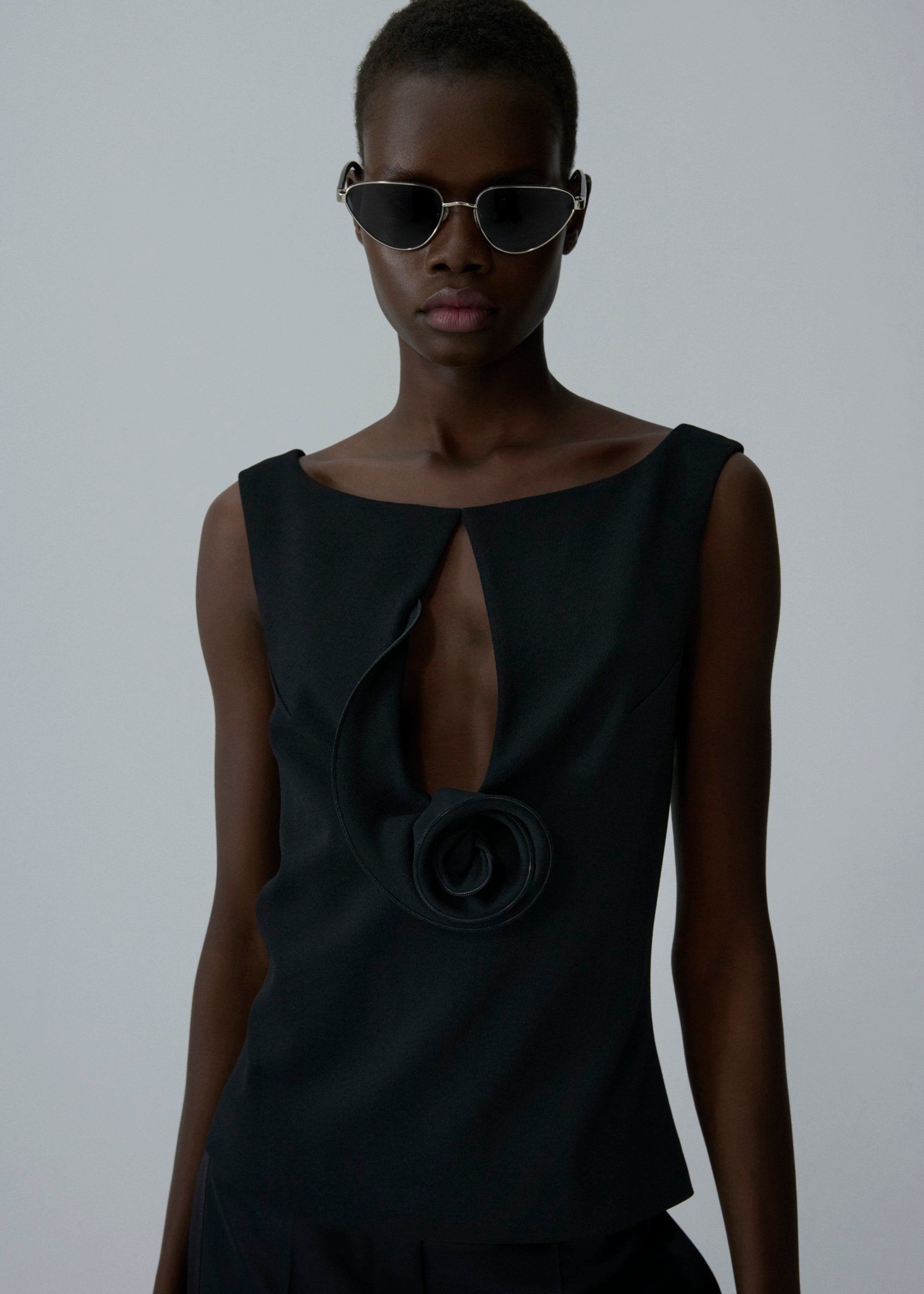 Floral appliqué keyhole top in black - 3