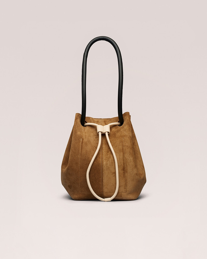 Nanushka ELONGATED BUCKET - Suede small bucket handle bag - Sand outlook