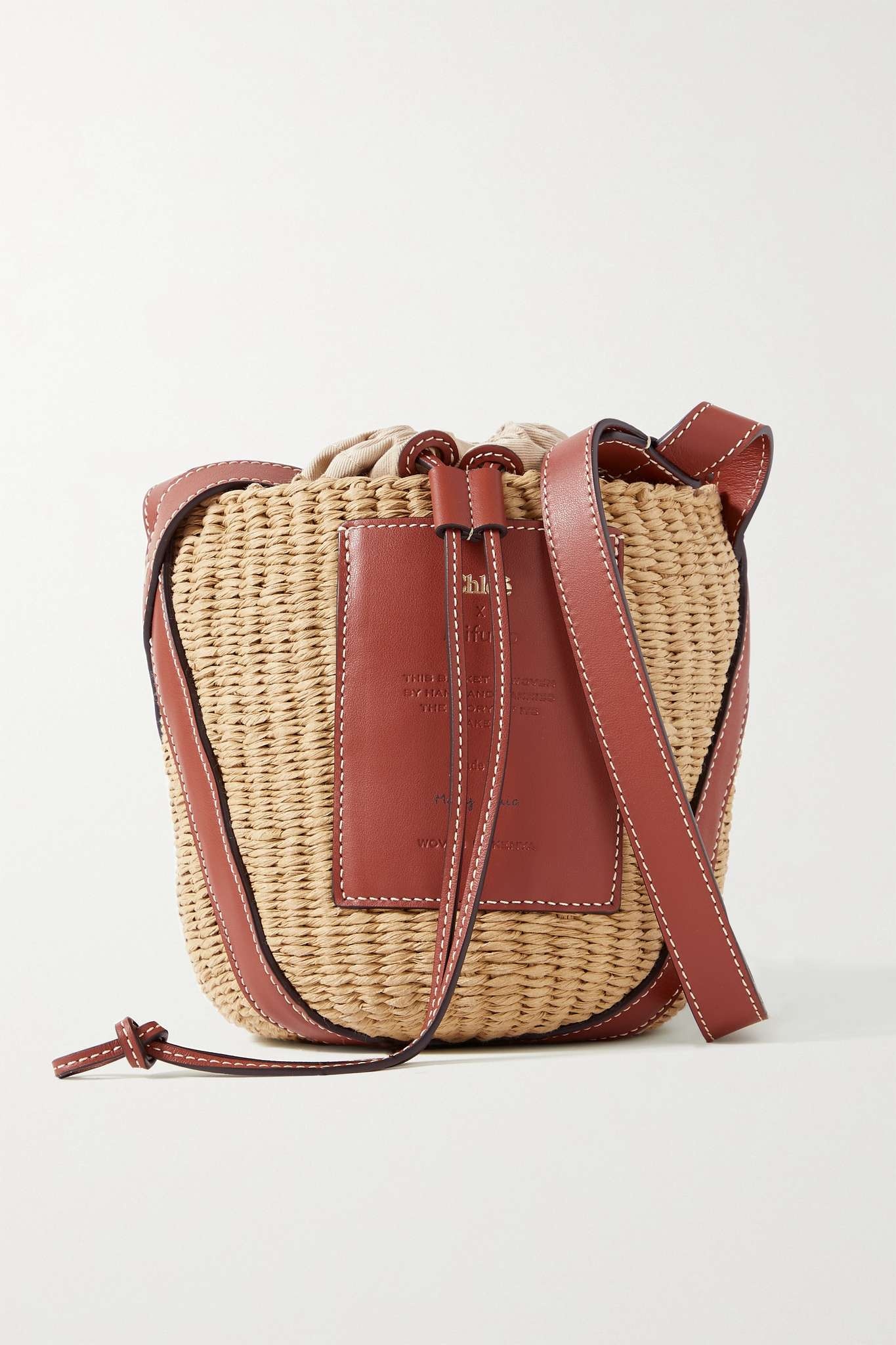 + NET SUSTAIN leather-trimmed raffia bucket bag - 1