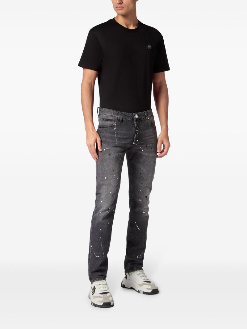 PHILIPP PLEIN paint-splatter low-rise slim-fit jeans outlook