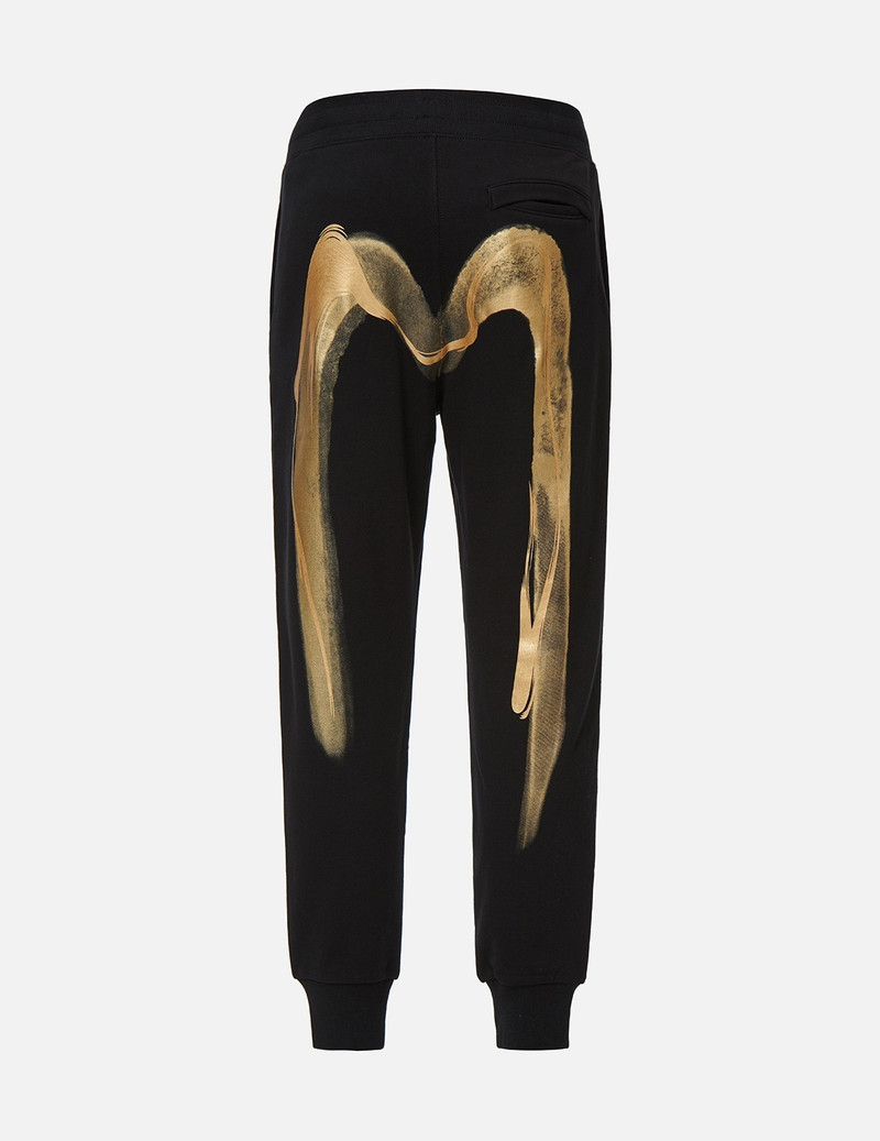 EVISU CALLIGRAPHY DAICOCK FOIL-PRINT SWEATPANTS outlook