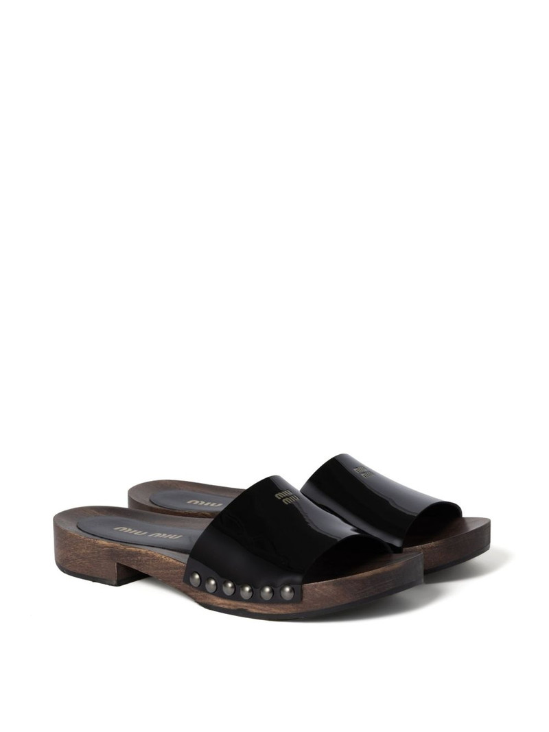 Miu Miu leather slides outlook