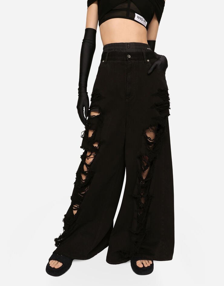 Flared jeans with ripped details - 4