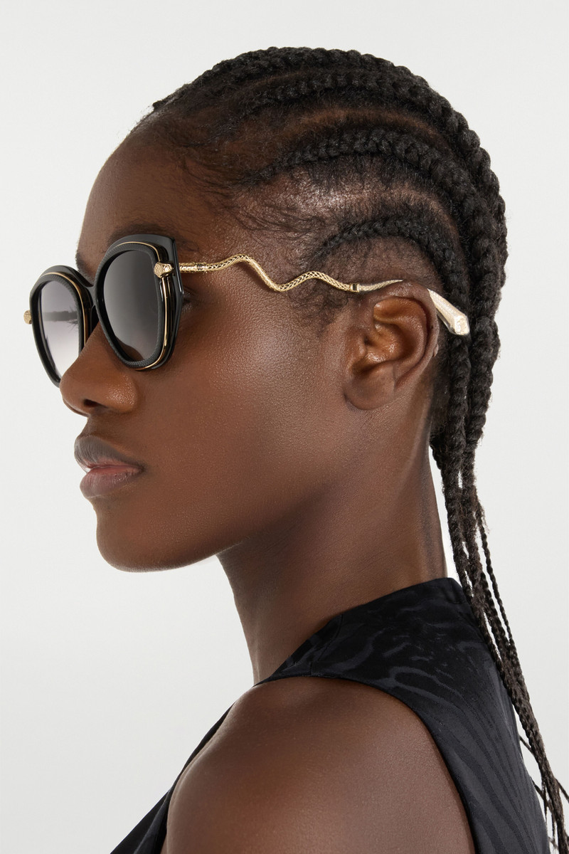 Roberto Cavalli Wide and feminine front sunglasses with double ring decoration outlook