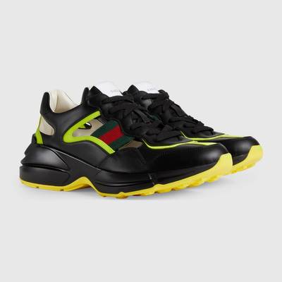 GUCCI Men's Rhyton sneaker with cut-out outlook