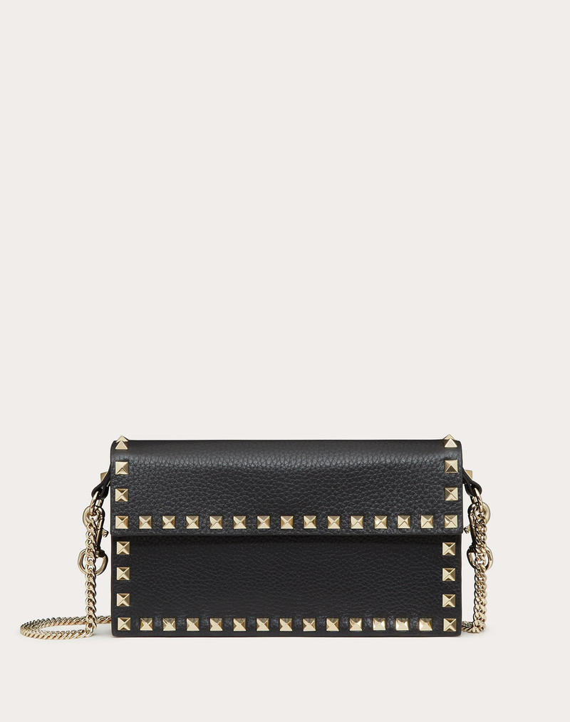 ROCKSTUD GRAINY CALFSKIN POUCH WITH ADJUSTABLE CHAIN STRAP 1