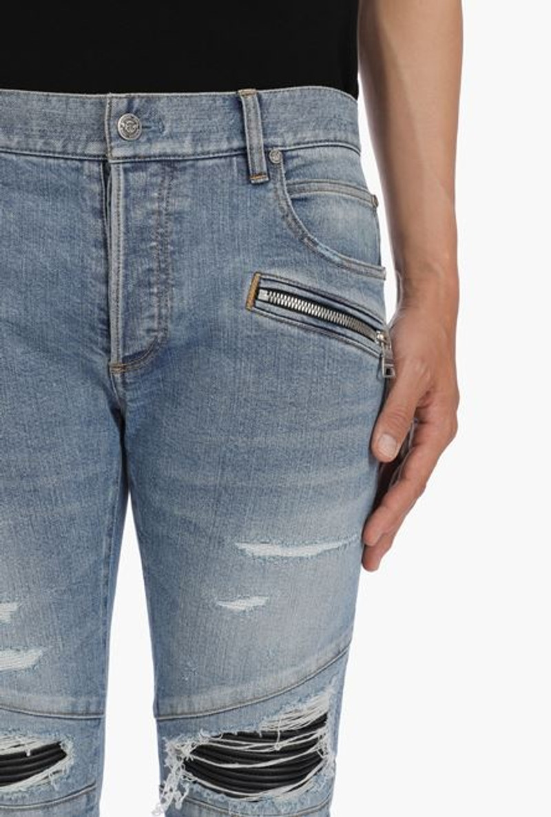 Slim-cut ripped blue cotton jeans with synthetic leather panels 8