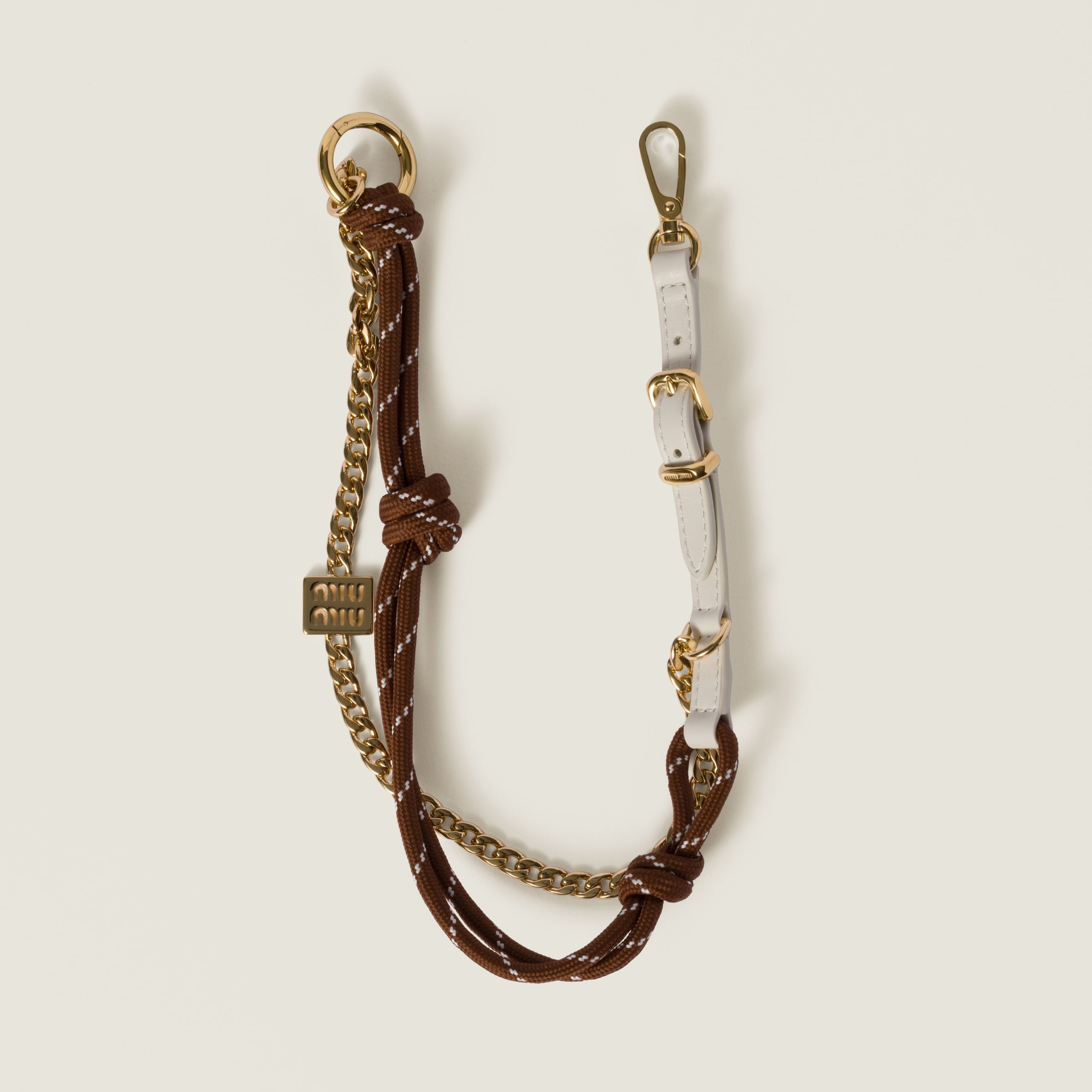 Leather, cord, and metal trick - 1