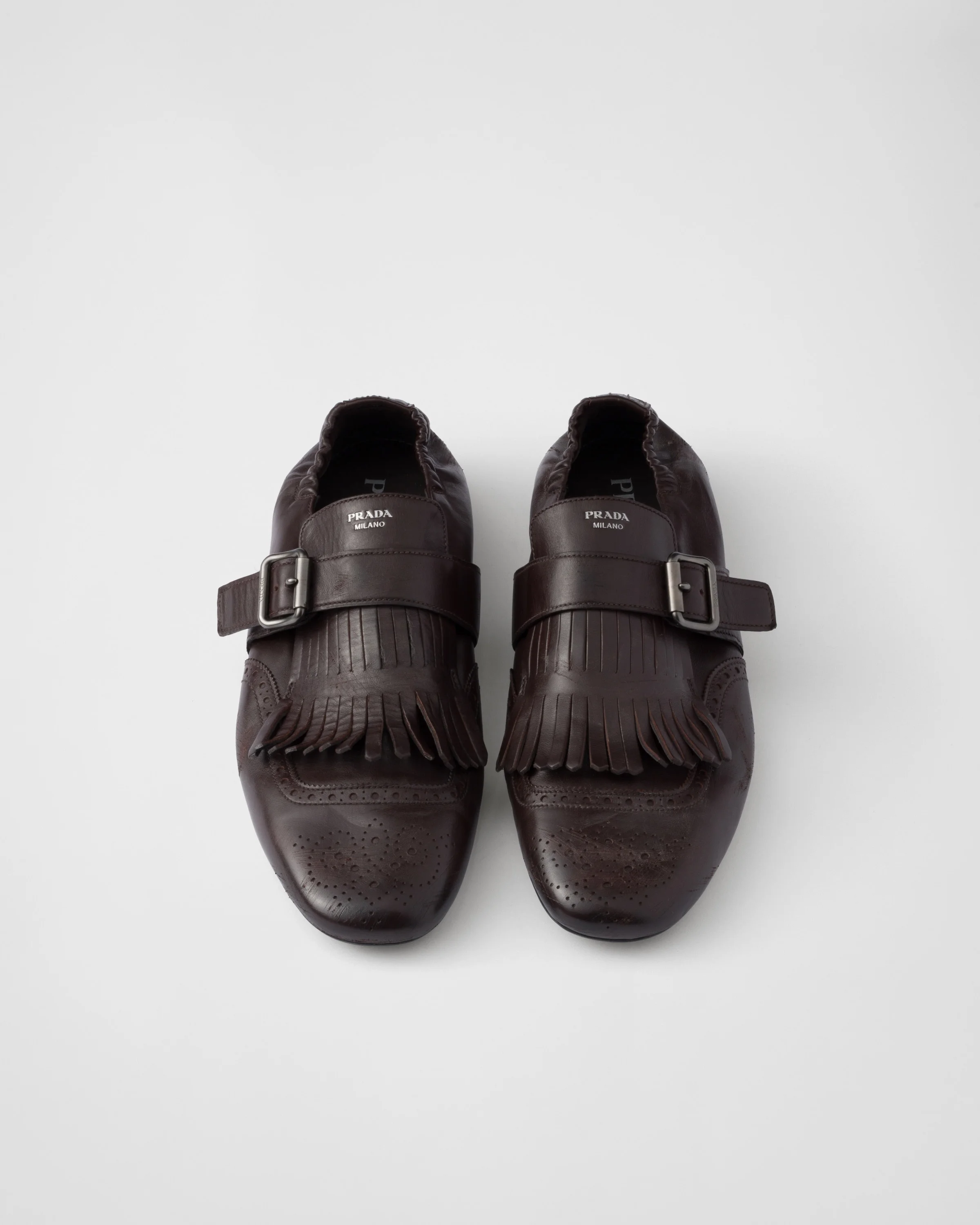 Prada Shuffle fringed monk strap shoes | REVERSIBLE display picture 1