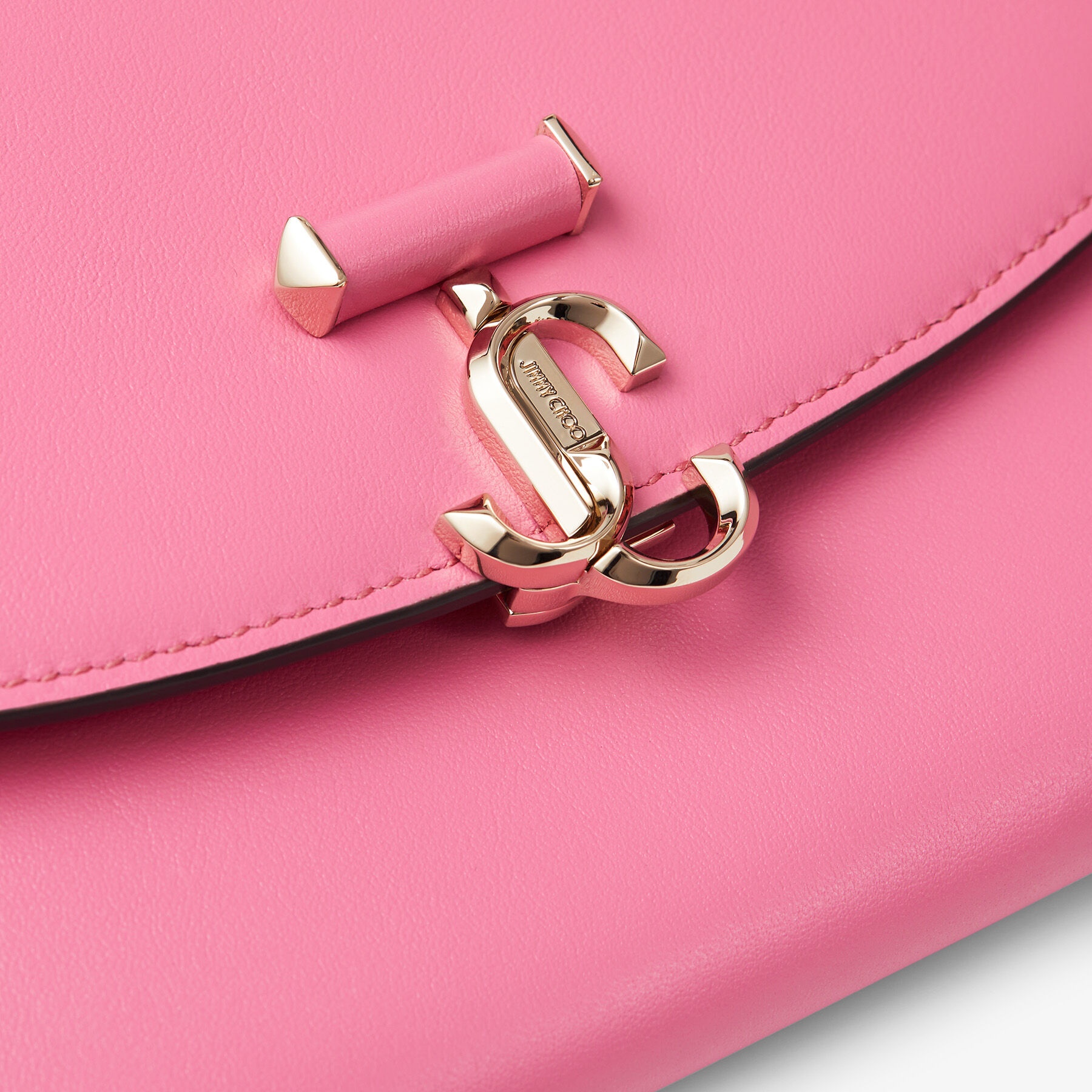 JC Envelope Pouch
Candy Pink Leather Pouch with Gold JC Emblem - 5