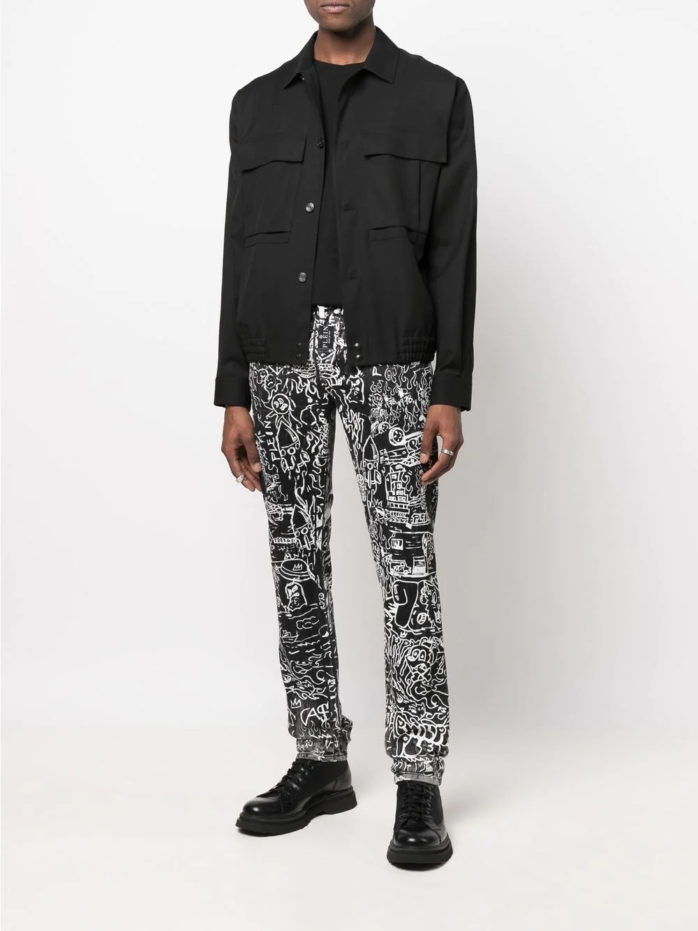 all-over graphic-print jeans - 2