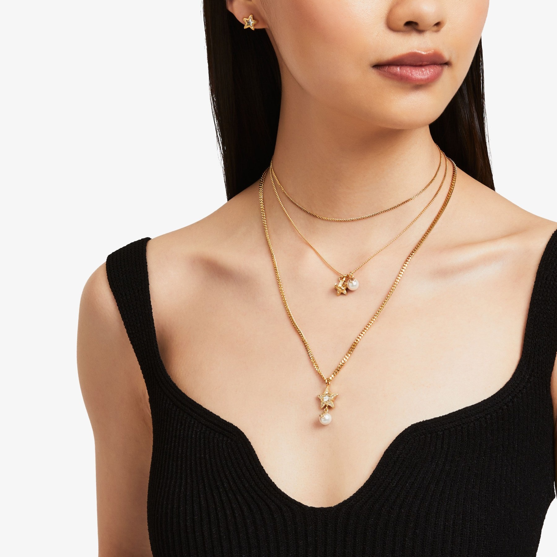Single Star Necklace
Gold-Finish Metal Necklace with Swarovski Crystal Star and Pearl - 5