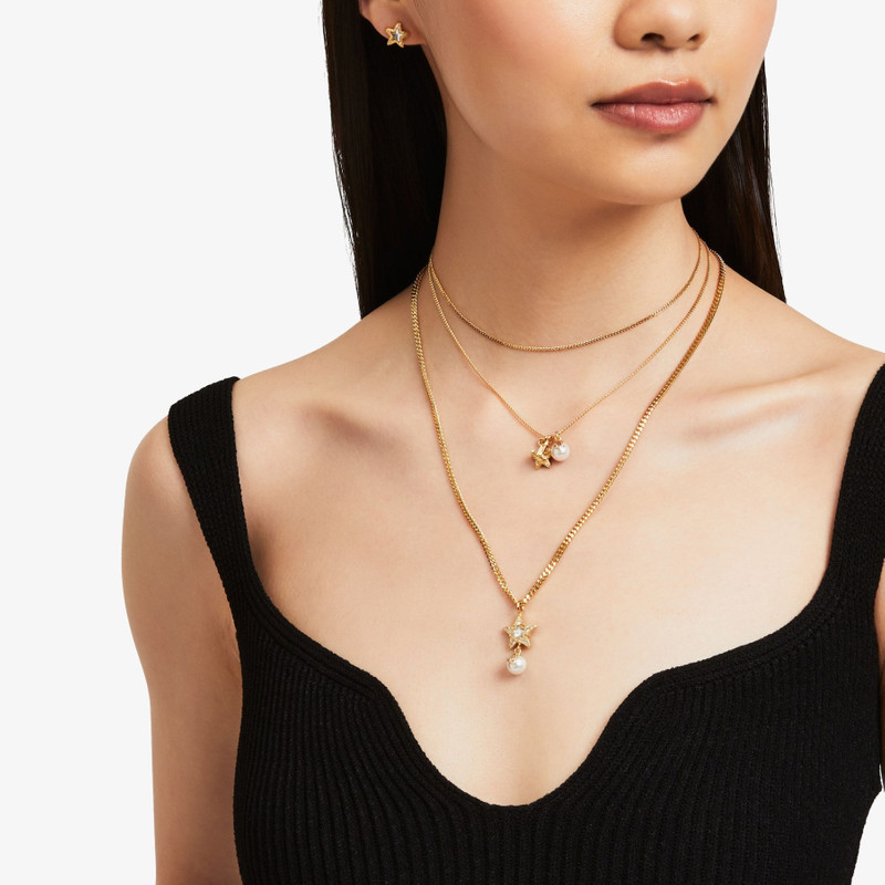 Single Star Necklace
Gold-Finish Metal Necklace with Swarovski Crystal Star and Pearl 5
