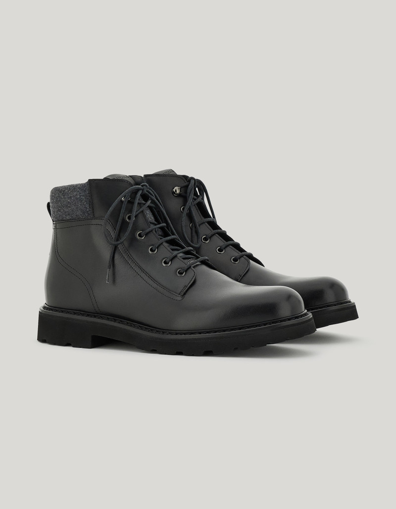 BLACK CALFSKIN ANKLE BOOT WITH PADDED WOOL DETAIL 1