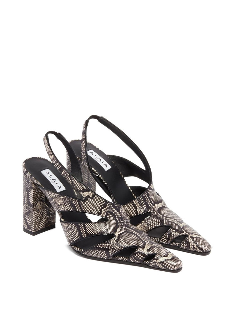 Alaïa 90mm snakeskin-effect engraved pumps outlook