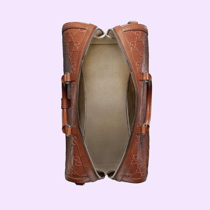 GG embossed duffle bag 8