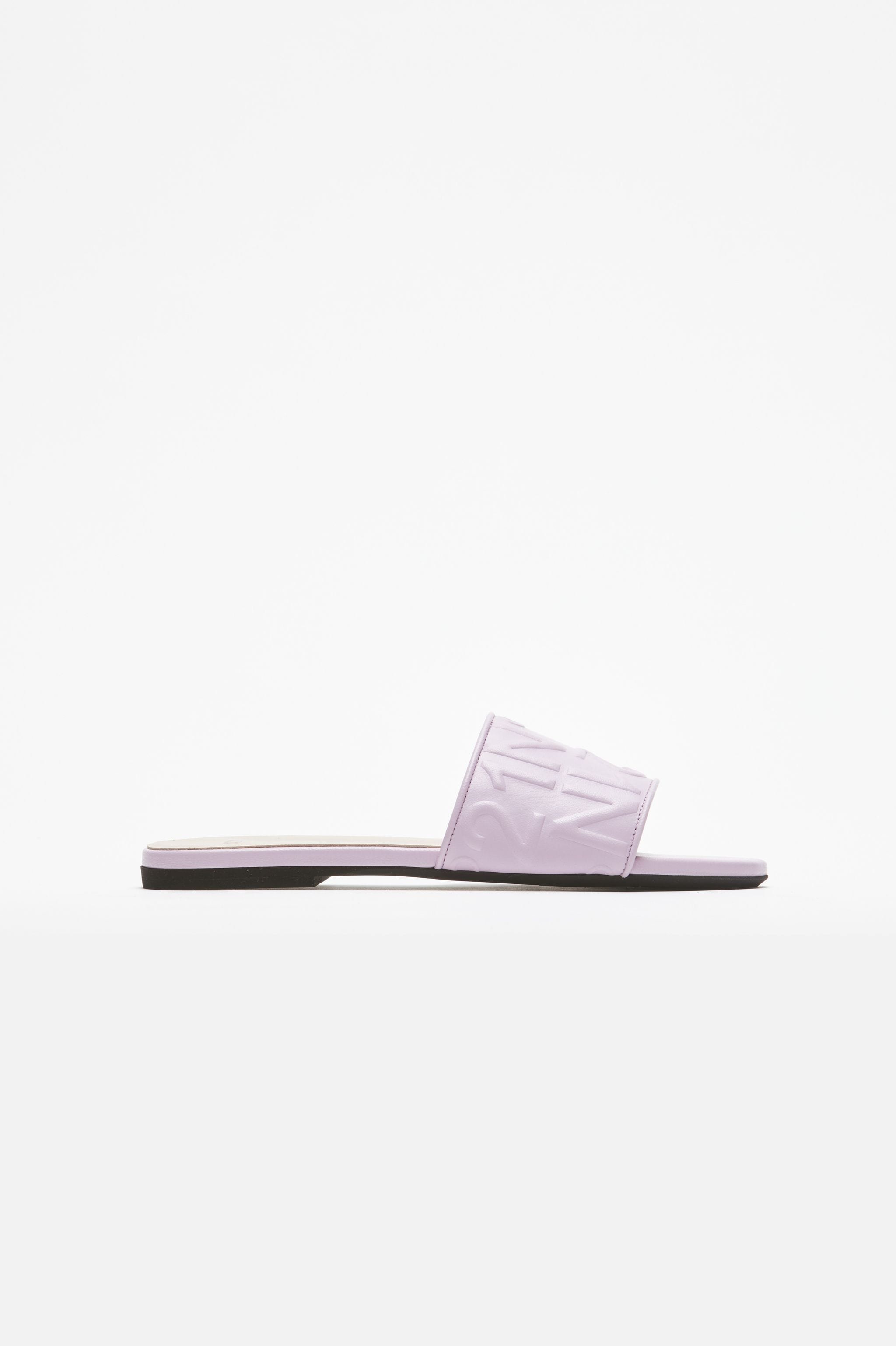 LOGO-EMBOSSED SLIDES - 1