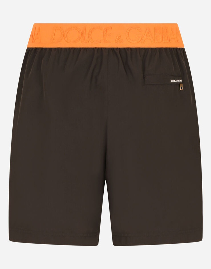 Mid-length swim trunks with patch 3