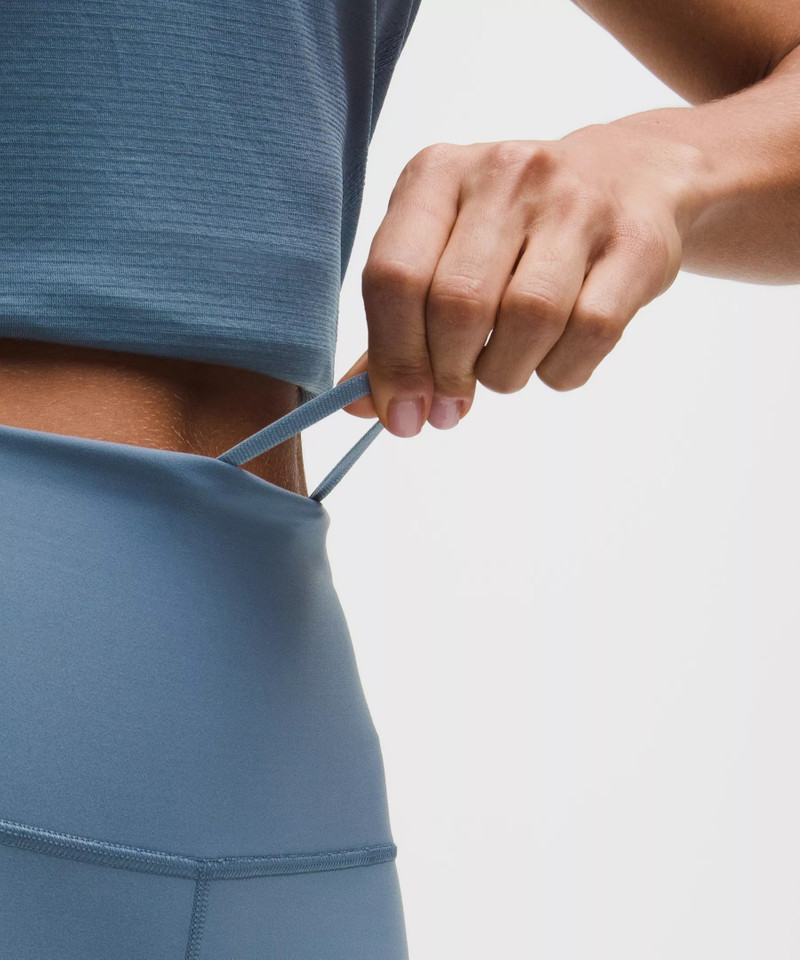 Wunder Train High-Rise Tight with Pockets 25" 4