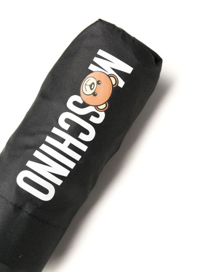 Moschino logo-print umbrella outlook