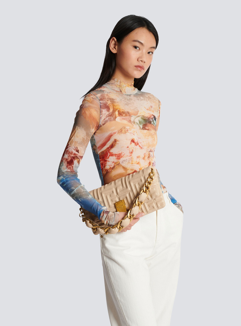 Balmain 1945 Soft quilted leather clutch bag outlook
