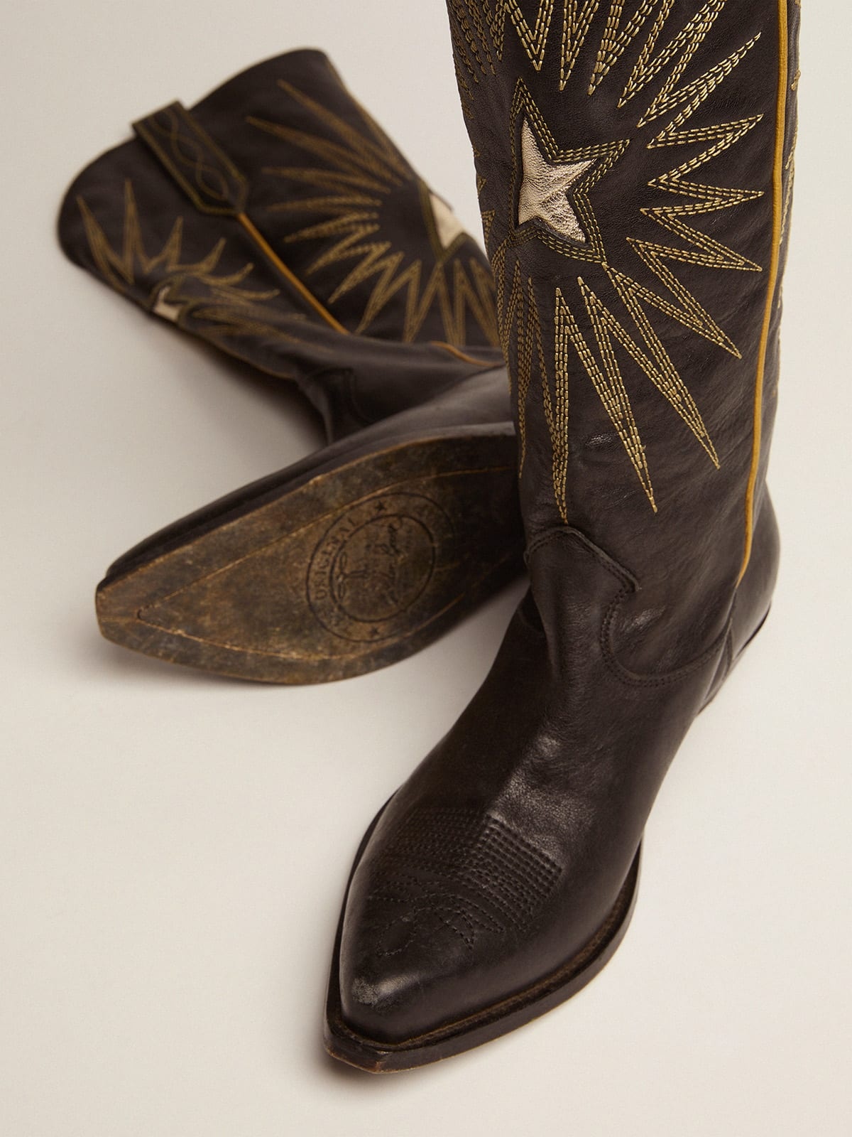 Women's boots in black leather with platinum star inlay - 4