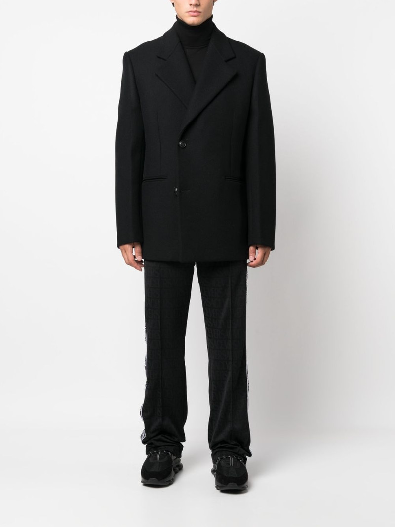 VERSACE Versace Allover pattern track pants outlook