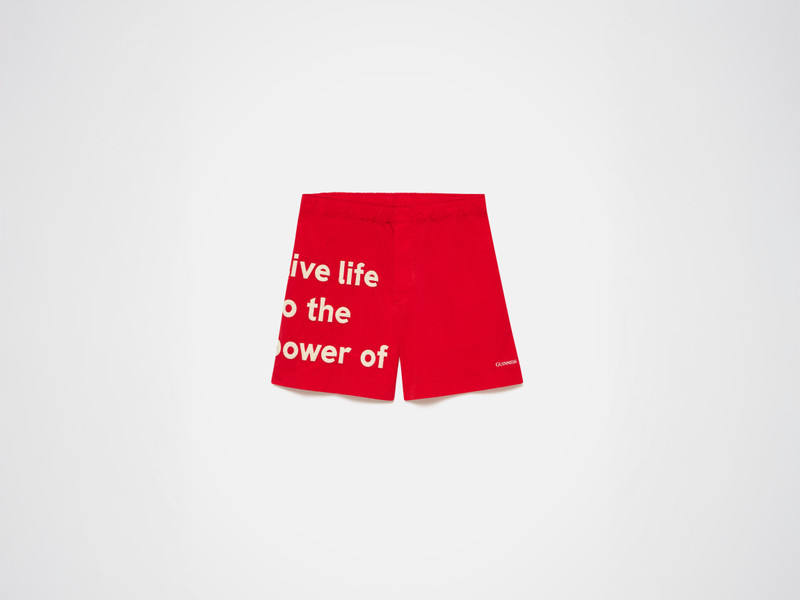 Unisex JW ANDERSON X GUINNESS SLOGAN TRACK SHORTS IN RED 1